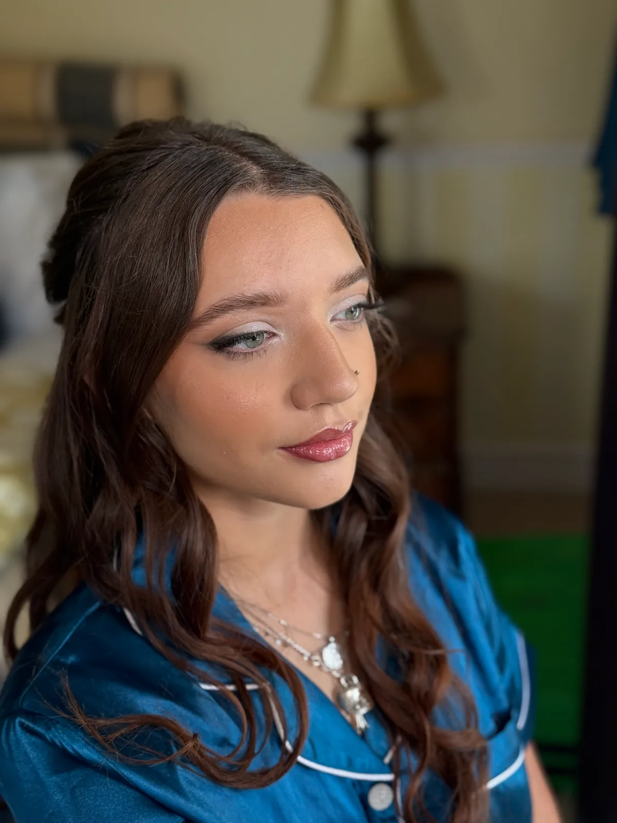 Occasion makeup with shimmering eyes and a rose lip