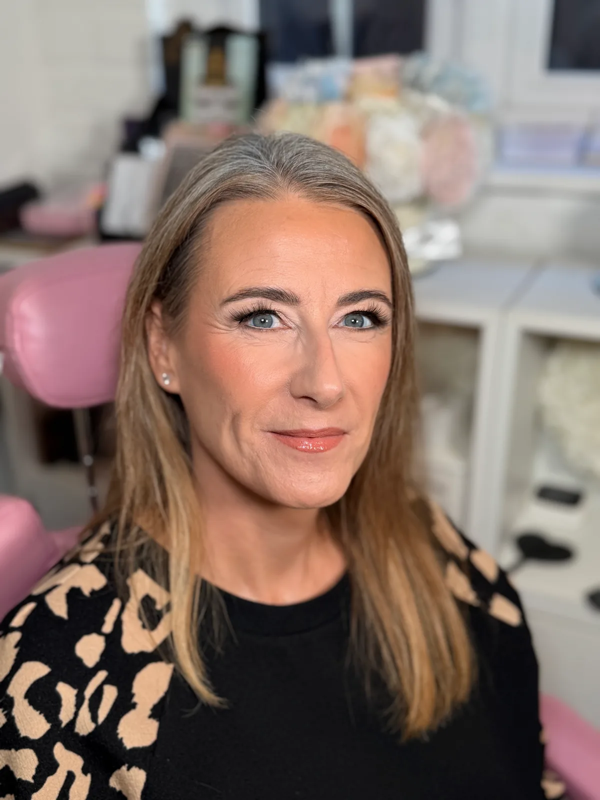 Occasion makeup with a soft smoky eye, defined lashes and a warm lip