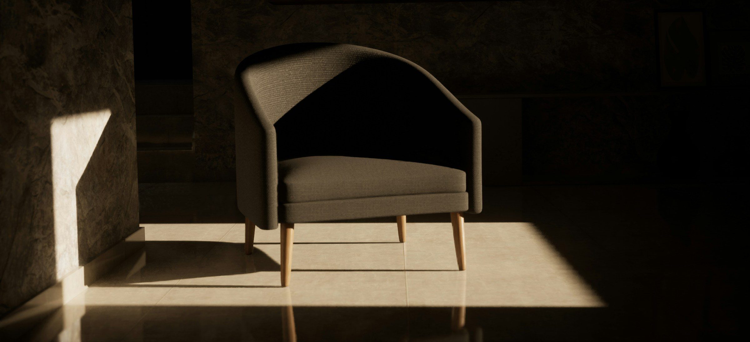 An empty upholstered armchair in a shaft of sunlight in a quiet, dim room