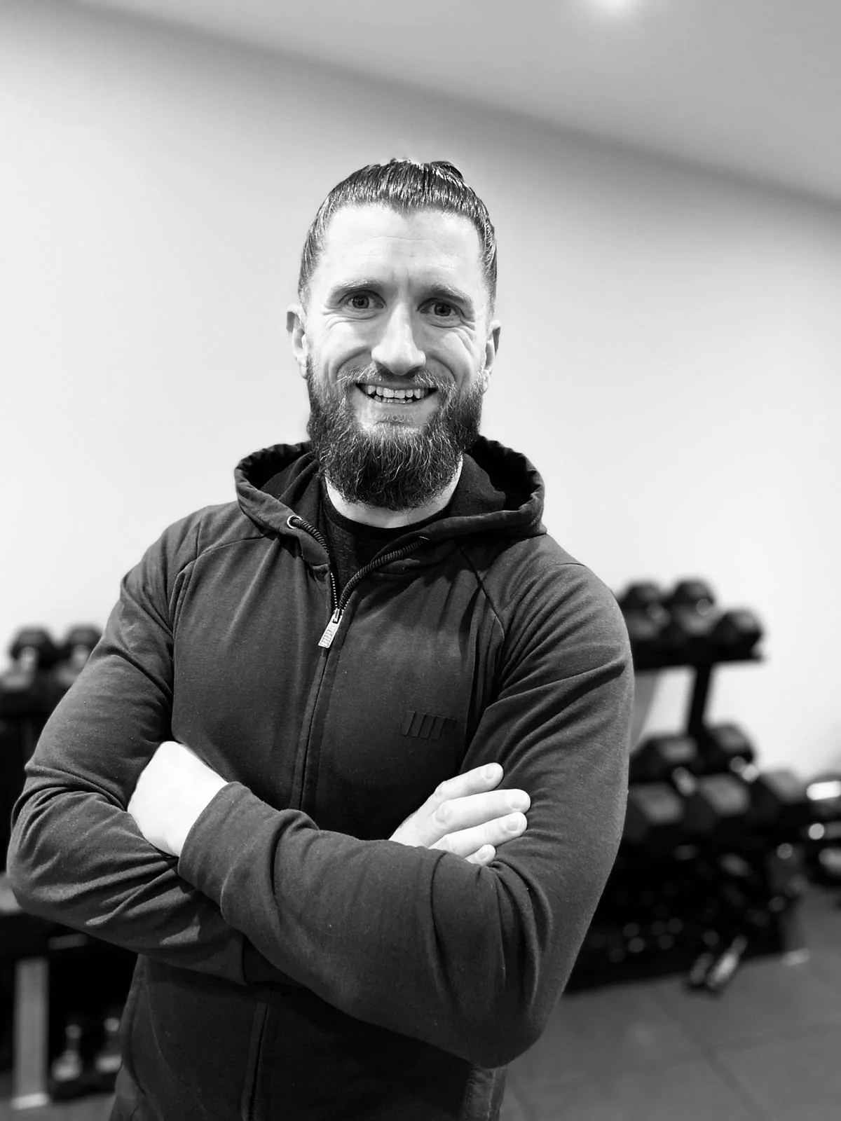 Nick Dootson standing in the private Eteneva Fitness gym