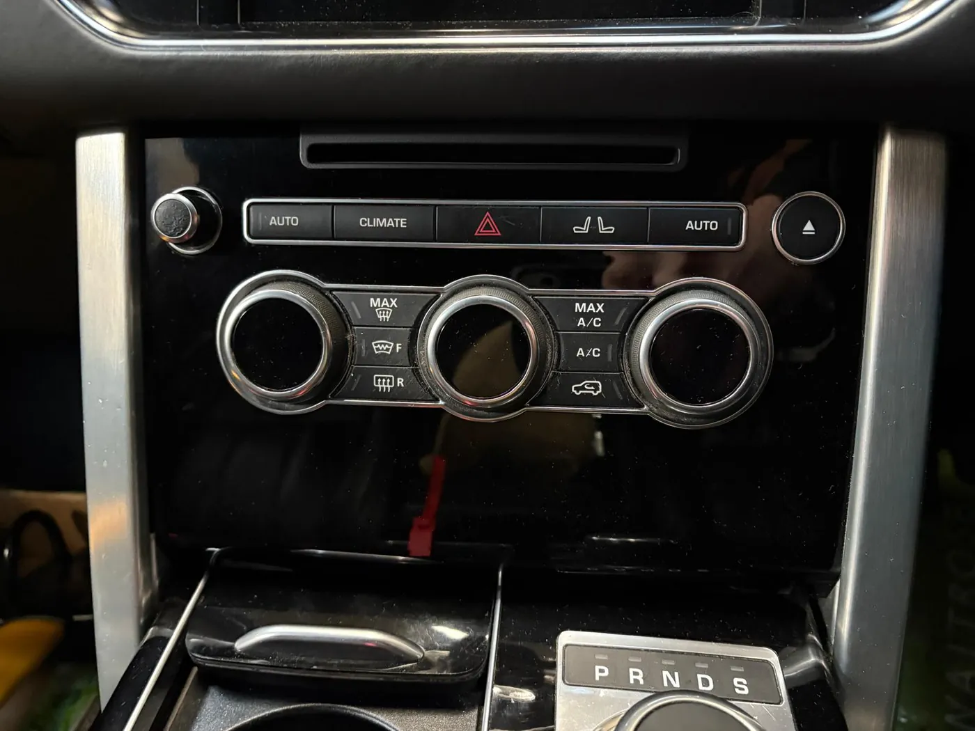 A Range Rover centre console in the His and Hers Motors workshop