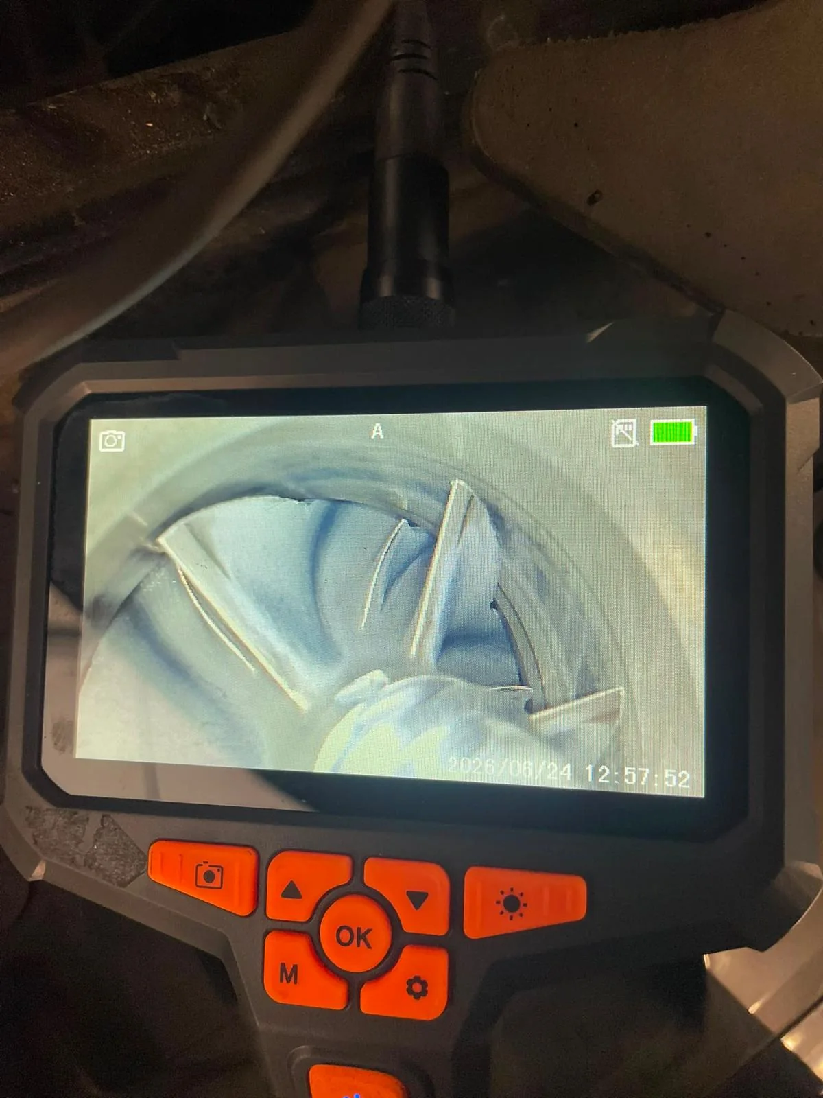 A borescope screen showing the inside of a cylinder