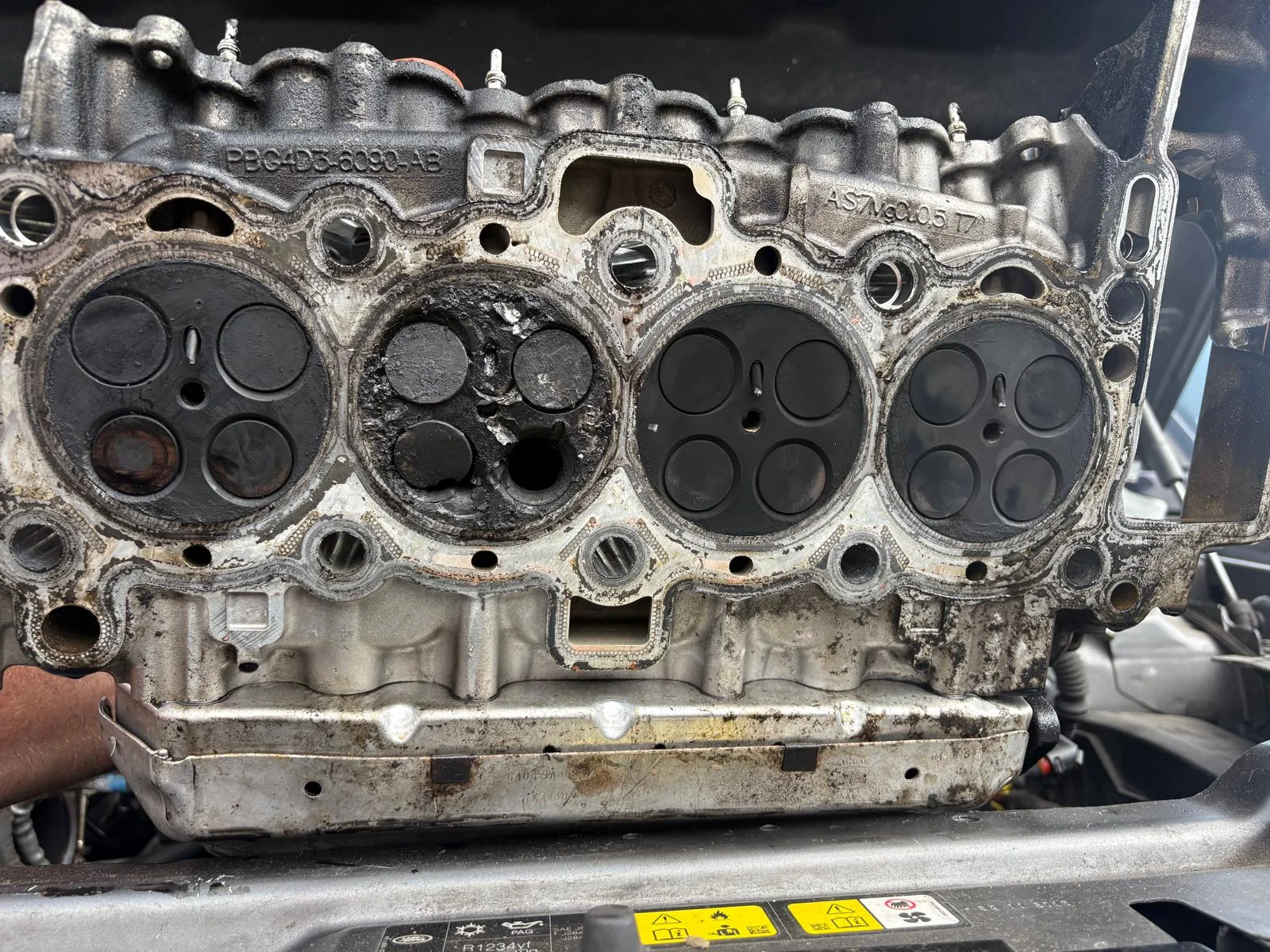 A cylinder head removed for inspection