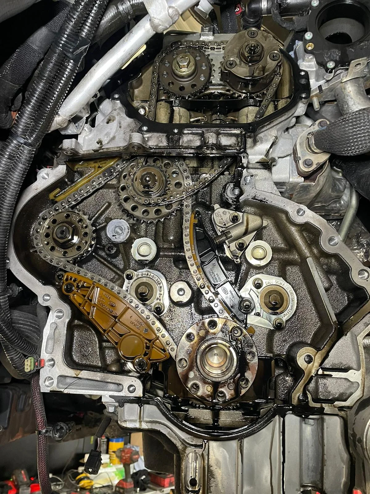 A timing assembly exposed during an engine repair
